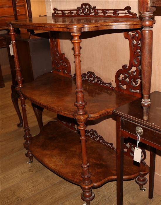 A Victorian walnut three tier whatnot W.107cm